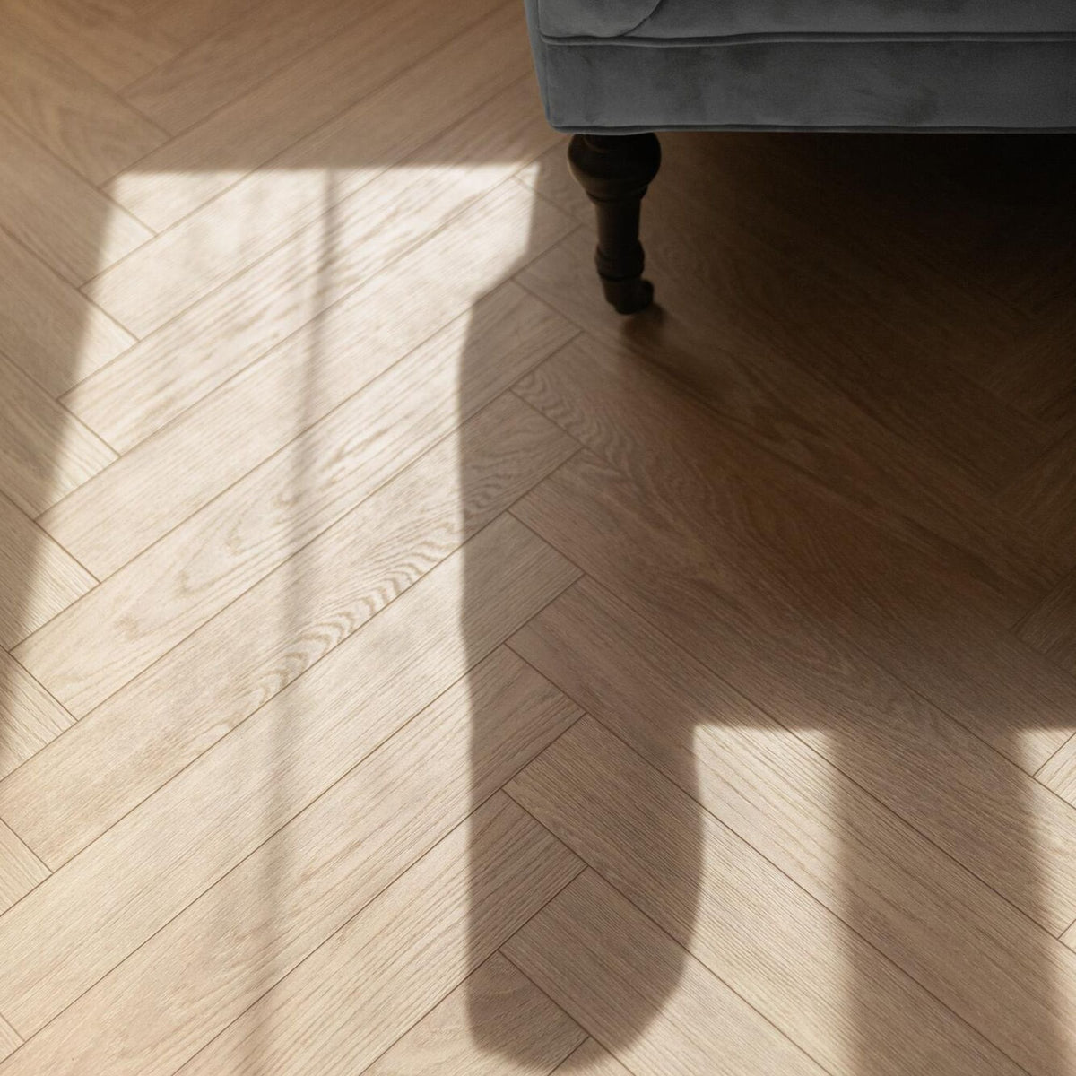 Charme Light Natural Laminate Herringbone Parquet Flooring – 84mm Wide – 8mm Thick